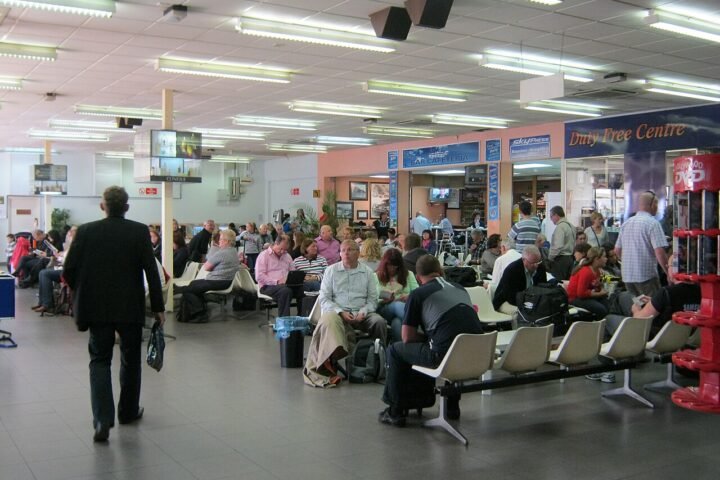 Airport departures board showing flight information