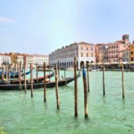 Gondolas at Hotel Ca' Sagredo on the Grand Canal near Rialto in Venice, Italy