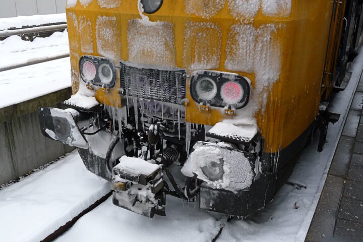 A frozen train in winter at Amsterdam Central Station