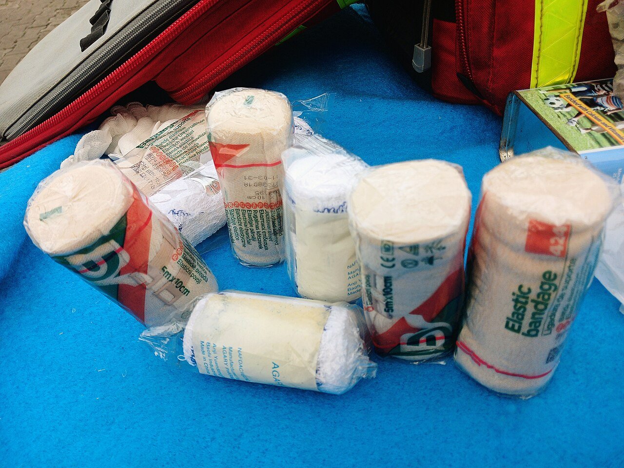 A standard first aid kit with essential emergency medical supplies